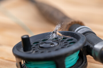 dry fly on a fly reel 