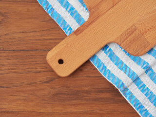 Cutting board or chopping board on wooden table. Wooden plate on desk. Top view