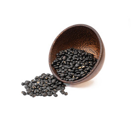 Black beans in wooden bowl on white background