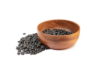 Black beans in wooden bowl on white background