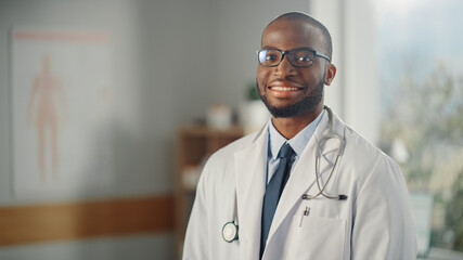 Close Up Portrait of Happy African American Family Medical Doctor in Glasses in Health Clinic....