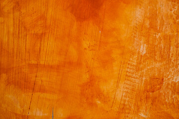 Textured wall brushed painted Background, Abstract Orange Oil Color.