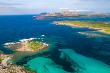 A body of water, La Pelosa, Stintino, and Asinara Island