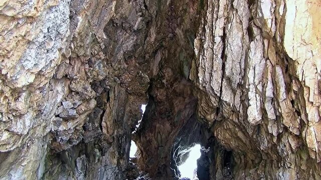 The fascinating grotto in the &ldquo;Natural arch&rdquo; cove, Palinuro, Italy.