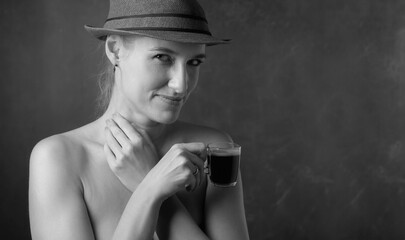 Portrait of a beautiful woman with cup of coffee.