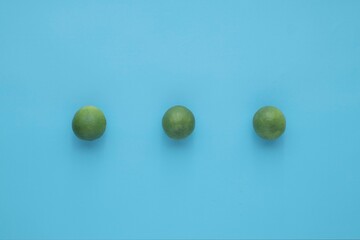 Natural fresh lime isolated on blue background