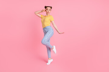 Fototapeta na wymiar Full size photo of optimistic nice brunette lady show v-sign kiss wear t-shirt pants isolated on pink color background