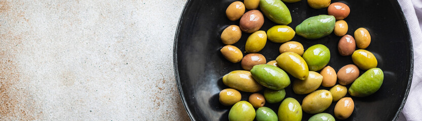 fresh olives pitted in plate on the table varieties of fruits vegan vegetarian food snack trend meal copy space food background rustic top view 