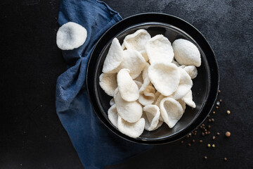 tapioca chips flour or rice chips meal snack copy space food background rustic. top view keto or...