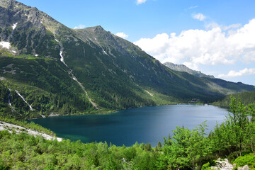 Naklejka na ściany i meble The beautiful lake Morskie oko in the High Tatras. View from lake Czarny staw pod Rysami. Poland.