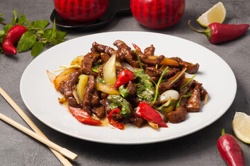 beef with vegetables and pepper in a sauce. chinese cuisine