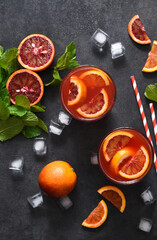 Red orange lemonade with mint..Summer drink. Top view.