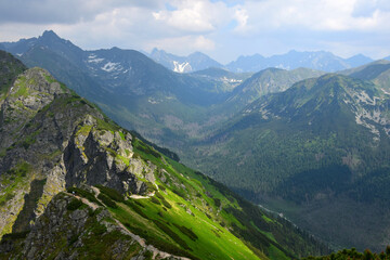 Naklejka na ściany i meble The ridgeway which leads vom mount Kasprowy wierch along the polish-slovakian border. High Tatras, Poland.