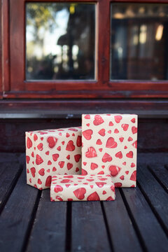 Rectangular gift box wrapped with heart paper