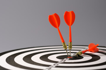 Goals concept - Smart goal setting, red three darts arrows in the target center business goal...