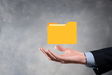 Businessman hold folder icon.Document Management System or DMS setup by IT consultant with modern...