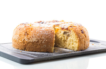 cooked sweet biscuit with dried apricots and nuts inside