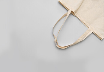 Reusable shopping bag on gray background. Cotton shopper on gray background,place for text