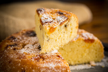 cooked sweet biscuit with dried apricots and nuts inside