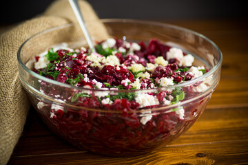 dietary salad of boiled beets with walnuts and cottage cheese