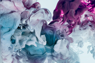 multicolored ink in water, abstract volumetric forms, dissolution in water.