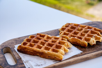 Belgian sugar waffles served on outdoor cafe terrace