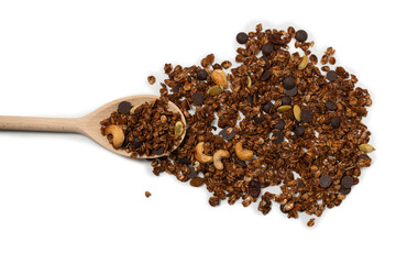 Chocolate granola cereal with nuts in a wooden spoon.