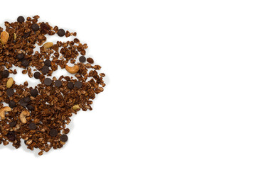 Chocolate granola cereal with nuts in a wooden spoon.