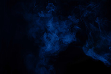 Blue and pink steam on a black background.