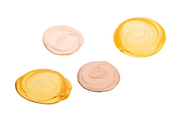 Liquid body and face highlighter isolated on white background. Golden and beige color.  Body cream.