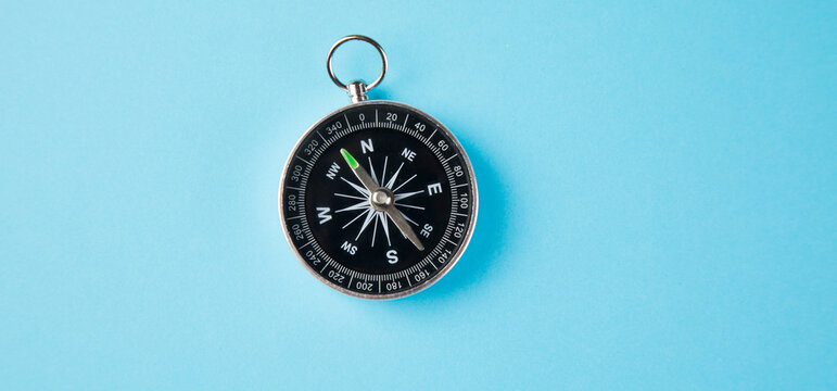 compass on a blue background