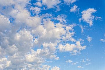 Blue sky with white clouds abstract background or texture.