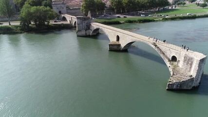 Aerial close up view of Saint-Bénézet also known as Pont d'Avignon is a famous medieval bridge in town of Avignon in southern France four arches and gatehouse have survived 4k high resolution quality