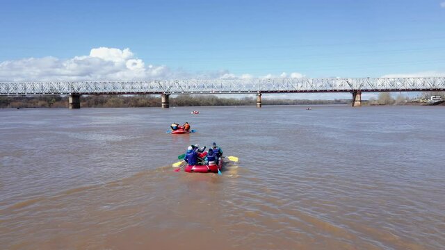 The concept of water safety. Lifeboats, vests. Freshwater water and bridge, countryside. Shooting on the move. High quality.