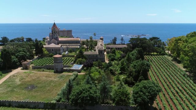 Aerial view of the gardens the church and monastery of the Lerins abbey located at Ile Saint Honorat island is the second largest of the Lerins-islands near the French Riviera town of Cannes 4k