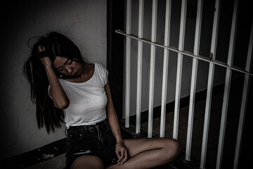 Women desperate to catch the iron prison,prisoner concept,thailand people,Hope to be free,If the...