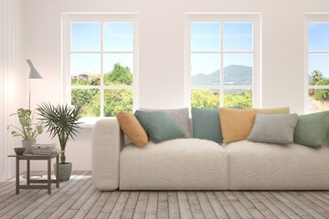 White living room with sofa and summer landscape in window. Scandinavian interior design. 3D illustration