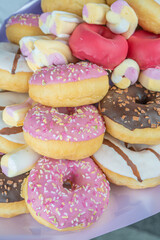 Sweet pochiki, muffins, sweets, close-up. There is a place for text Concept of a sweet gift, congratulations on the holiday.