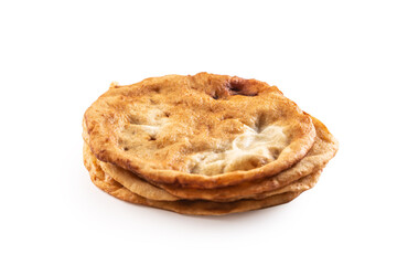 A bunch of traditional hungarian deep fried langos in an isolated white backround