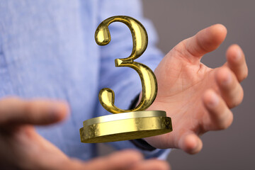 3rd place letter in 3d in hand