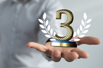 3rd place letter in 3d in hand
