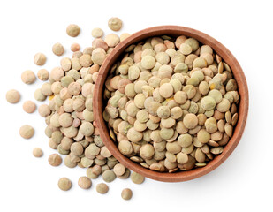 Lentils in wooden plate on white background, isolated. Top view