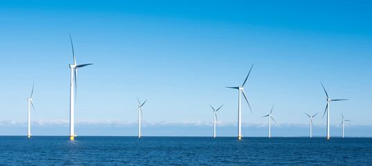 wind turbines in water of ijsselmeer near Urk in dutch part of noordoostpolder - 430854812