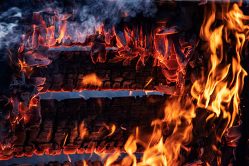 Burning boards on a black background, fire texture