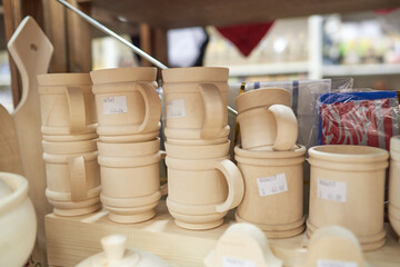 Many white wooden mugs blanks without a print