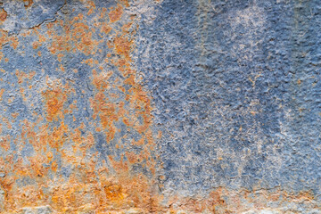 Blue metal background, metal sheet texture, covered with rust from time to time