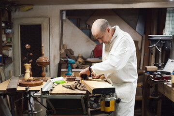 Cabinetmaker working with a wooden board