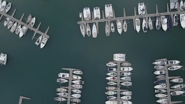 Yachts and sailing boats at port aerial top view. Marina Rubicon sailing haven in Playa Blanca, Lanzarote, Canary Islands