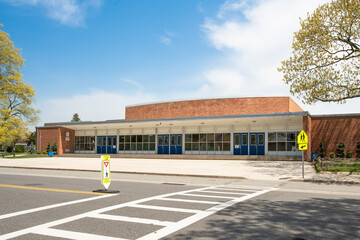 Exterior view of a typical American school building - 430863689