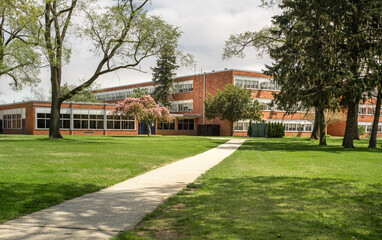 Exterior view of a typical American school building - 430863813